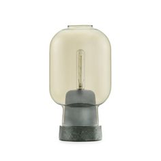 a light that is sitting on top of a table in front of a white background