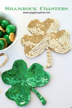 green and gold shamrocks next to a bowl of candy