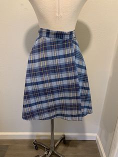 1970's Vintage Wrap Around Skirt ~ Navy Blue Vintage Plaid Print Skirt, Very Good Condition The two last photo shows its small issues. I will be mailing it Priority Mail and First Class International. Measurements Adjustable Waist ~ 26 Inch Length ~ 22 Inch Vintage Mini Skirt For School, Retro Skirted Bottoms For School, Retro Blue Mini Skirt, Vintage Blue Pleated Skirt Bottoms, Vintage Plaid Skirt For School, Retro Blue Lined Skirt Bottoms, Retro Blue Cotton Skirt, Vintage Blue Pleated Skirt, Retro Blue Flared Skirt Bottoms