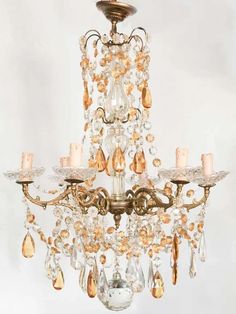 a chandelier with many lights hanging from it