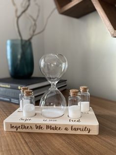 two salt and pepper shakers sitting on top of a wooden tray