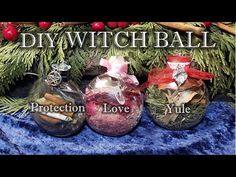 three glass vases filled with different types of christmas decorations and words diy witch ball protection love yule