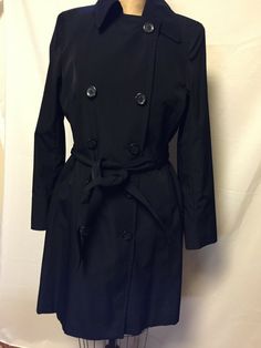 Calvin Klein Womens Double Breasted Trench Jacket XS Black NWT Calvin Klein Double Breasted Trench Jacket NWT In Extra Small. This Double Breasted Trench from Calvin Klein has a belt, notch collar, back slit and 2 Front pockets  100% polyester Machine wash 3/4-length trench Belted   Bust measures 36" and Length is 37"   Please note color may vary due to flash or personal monitor settings.  If you have any questions, please contact us. ABOUT US All items we have are new, but some are without tags Copy Machine, Trench Jacket, Notch Collar, Tag Sale, Notched Collar, Double Breasted, Trench Coat, Calvin Klein, Flash