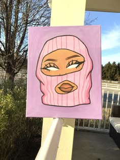 a painting of a woman's face wearing a pink knitted hat and scarf