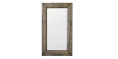 a mirror that is sitting on top of a wall next to a white wall with a wooden frame