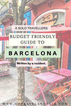 an outdoor patio with tables and umbrellas in front of colorful buildings, text reads a solo traveler's budget friendly guide to barcelona written by a resident