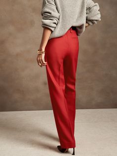 Sharp and smart, this extra long pant is cut to wear with your favorite heels.  A high waist and straight leg adds length to every step.  ITALIAN WOOL: Soft and smooth, this wool fabric from Italy's Marzotto mill is perfect for cooler weather.  Zip f Fitted Bottoms With Straight Hem For Winter, Straight Leg Bottoms For Formal Winter Wear, Straight Leg Bottoms For Formal Winter Occasions, Formal Straight Leg Bottoms For Winter, Tailored High-waisted Winter Dress Pants, Fitted Wide Leg Winter Dress Pants, Fitted Wide Leg Dress Pants For Winter, Winter Wide Leg Fitted Dress Pants, Fitted Straight Dress Pants For Winter