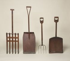 four different types of garden tools lined up