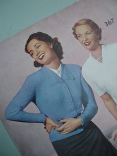 an old photo of two women in blue and white