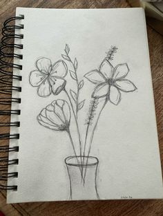 a pencil drawing of flowers in a vase