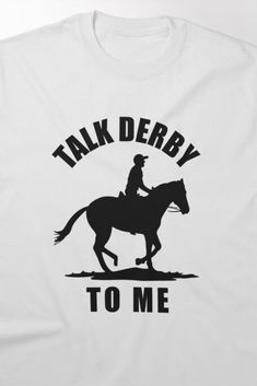 Fun horse riding t-shirt featuring the playful phrase 'Talk Derby to Me' with a jockey in action, capturing the excitement of derby racing. Perfect for horse racing fans with a sense of humor, this design is sure to start conversations and show off your love for the sport. Horse Racing Quotes, Talk Derby To Me, Racing Quotes, Me Design, Funny Horse, Horse T Shirts, Sense Of Humor, Horse Racing