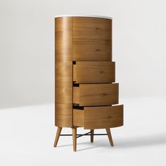 a tall wooden cabinet with five drawers