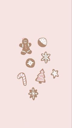 some cookies and candy on a pink background