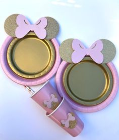 pink and gold mickey mouse plates with straws