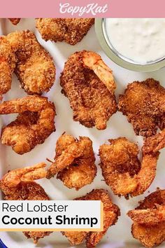 red lobster coconut shrimp served with yogurt sauce on a white platter for dipping