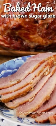 baked ham with brown sugar glaze on a blue and white plate