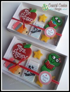 two decorated cookies in the shape of an apple and teacher's day gift box