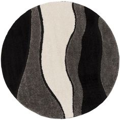 a round rug with black, white and grey stripes on the bottom in an oval shape