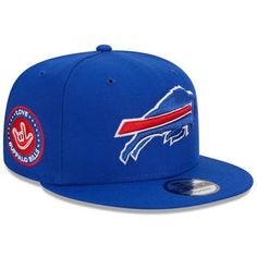 The NFL ASL Collection by Love Sign is another step from the NFL and the Buffalo Bills to unite football fans from all walks of life. The American Sign Language sign for "I Love You" is featured on this Side Patch 9FIFTY Snapback Hat. Spread the love for your Buffalo Bills in this New Era cap. Officially licensed Structured fit High Crown Material: 100% Polyester Snapback One size fits most Flat bill Raised embroidered graphics Imported Wipe clean with a damp cloth Six panel construction with ey Buffalo Bills Hat, Buffalo Bills Gear, Nfl Buffalo Bills, American Sign Language, Nfl Gear, Love Sign, The Buffalo, Shield Design, New Era Cap