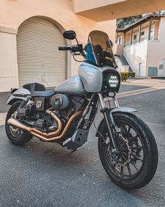 a motorcycle parked in front of a building