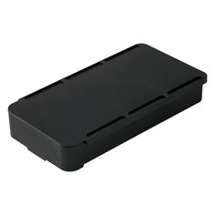 a black plastic box with two compartments on the bottom and one in the middle, for storage