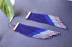 ❤️Add a fun touch to your look with these blue fringe dangle earrings. These versatile earrings can help you create that effortless style, perfect for every occasion. Length: 4.5 inches ❤️ Buy for yourself or it makes for a perfect gift for relatives and friends. color beads used: dark blue blue  light blue light purple Handmade using nylon beading thread hooks made using copper metal. Beading Thread, Color Beads, Copper Metal, Seed Bead Earrings, Bead Earrings, Etsy Fashion, Seed Bead, Beaded Earrings, Seed Beads