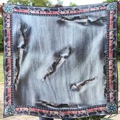 For all of you who can't get enough turquoise jewelry and denim, this large 35x35 silk charmeuse scarf will add a classic, rustic feel to any dress up or dress down outfit. This is a fun scarf dressed up, at the yoga studio or with a t-shirt. SIZE: 35" x 35" (The Long-Tall) FABRIC: 100% Silk Charmeuse COLOR: Distressed denim body with red and dark blue aztec border. Turquoise and silver conchos as accent. CARE SUGGESTION: Dry clean preferred. Iron on silk setting or use steamer. 1"x1" Fringe log Bohemian Silk Scarves One Size, Bohemian Silk Scarf With Bandana Print, Bohemian Bandana Print Silk Scarf One Size, Bohemian Silk Scarves For Festivals, Bohemian Silk Scarf For Artistic Expression, Dress Down Outfit, Swim Wrap, Scarf Hanger, Cooling Scarf