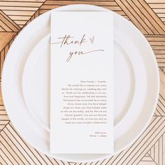 a white plate with a thank you card on it