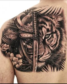 a man's chest with a tiger and helmet on it