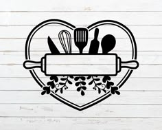 a heart shaped sign with utensils and spoons in it on a wooden background