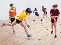 several children are playing with toys on the floor