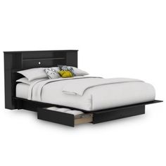 a bed with two drawers underneath it and a white bedspread on the bottom