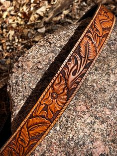 This is a hand made belt that will be custom made to your waist size.  It is 1 1/2 inches wide and has a western style floral design that is hand carved the length of the belt.  This style of carving comes from designs used on western trophy saddles for over the past 100 years. The belt is a single piece of quality full grain leather and is lined with black pigskin. The buckle (not included) is secured with screws making it easy to change buckles. The quality of this belt is far above the typical department store belt.  It will last you many years and it comes with a money back guarantee. When you order this belt, I will work with you to determine the correct length.  Once we have determined your size, I will make the belt specific to you and your measurements.  The buckle shown is only an Rustic Hand Tooled Belt For Western-themed Events, The One Show, Pig Skin, Suspender Belt, Single Piece, Handcrafted Leather, To Color, Suspenders, Full Grain Leather