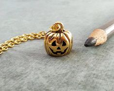 Jack O Lantern Necklace SMALL Gold Pumpkin Necklace Jack-O-Lantern Jewelry Halloween Necklace Hallow Halloween Themed Pendant Necklace With Charms, Halloween Nickel-free Pendant Necklace, Halloween Nickel Free Pendant Necklace, Nickel-free Pendant Necklace For Halloween, Nickel-free Gold Necklace For Halloween, Gold Pumpkin, Pumpkin Necklace, Gold Pumpkins, Jewelry Halloween