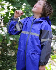 Children's One-Piece Rain/Trail Suit The one-piece suit is a versatile outer layer for adventuring in any weather. The suit is lightweight, packable, and seam-sealed with adjustable waist cinch. Reflective safety strips ensure better visibility. Waterproof center zipper and velcro arm cuffs keep clothes dry. Neoprene cuffs provide for a secure fit around boots. Constructed with a PU membrane layered fabric for durable waterproof functionality, the suit is rated to 8000mm water resistance and 300 Fishing Waders, Rain Suit, Layered Fabric, Arm Cuffs, Layering Outfits, Arm Cuff, Drying Clothes, Buckle Boots, One Piece Suit