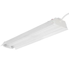 a white fluorescent light fixture on a white background with clippings for the cord