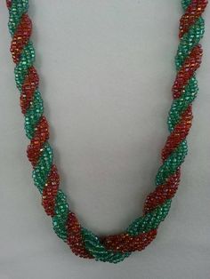 This turquoise and tangerine seed bead necklace is done in a double spiral pattern.  Each bead is individually hand woven.  Length is 18". Spiral Necklace, Spiral Pattern, Seed Bead Necklace, Beaded Necklaces, Bead Necklace, Seed Bead, Hand Woven, Seed Beads, Necklace Etsy