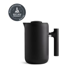 a black coffee pot is shown with the label for best new product in front of it