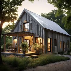 a house that is made out of wooden planks and has windows on the side