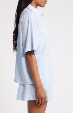 Crisp PJs with a collared short-sleeve shirt and elastic-waist shorts are ones you'll want to wear all weekend long. 26 1/2" length top; 2 1/2" inseam; 31" leg opening; 12 1/2" front rise; 16" back rise (size Medium) Top has front button closure; notched collar; short sleeves; chest patch pocket Shorts have elastic waist 55% cotton, 45% viscose Machine wash, tumble dry Imported Blue Collared Relaxed Fit Sleepwear, Blue Short Sleeve Sleepwear For Summer, Relaxed Short Tops For Daywear, Short Sleeve Shirt For Loungewear, Short Sleeve Relaxed Fit Shirt For Loungewear, Solid Color Short Sleeve Sleepwear For Summer, Relaxed Fit Short Sleeve Loungewear Shirt, Relaxed Fit Short Sleeve Shirt For Loungewear, Relaxed Fit Camp Collar Shirt For Daywear