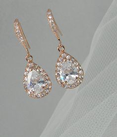 Rose Gold Crystal Bridal earrings Wedding by CrystalAvenues, $34.00 Crystal Bridal Earrings With Bling For Anniversary, Dazzling Crystal Teardrop Bridal Earrings, Anniversary Bridal Bling Crystal Earrings, Anniversary Bridal Earrings With Crystal Bling, Dangle Crystal Earrings With Bling For Anniversary, Dazzling Sparkling Drop Bridal Earrings, Wedding Teardrop Earrings With Rhinestones, Teardrop Bridal Earrings With Rhinestones, Wedding Teardrop Pendant Earrings With Sparkling Stones