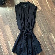 Never Worn Black V-neck Vest For Night Out, Chic Black Vest For Workwear, Black Sleeveless Vest For Spring, Black Denim Vest For Spring, Casual Black Vest For Night Out, Black Sleeveless Cotton Vest, Black Cotton Sleeveless Vest, Black Sleeveless Vest For Day Out, Black Cotton Vest For Work