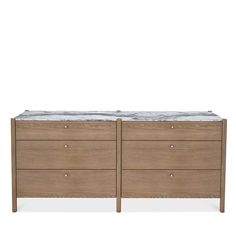 two wooden drawers with marble top in front of a white background and one drawer is open