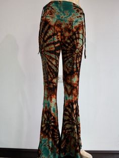 "These tie dye splatter bell bottoms are made for movement! Perfect for yoga and flow activities. Handmade and hand-dyed, 🌈 The fitting around the thigh is flattering & shaping until the material billows out at the knee into a wide flare.  Featuring drawstrings on either side of the thigh that can be cinched for shape and length adjustment! The material consists of a quality cotton Lycra blend; cotton giving ultra softness while Lycra holds everything in.  95% Cotton 5% Lycra (highly *◅ ↠ ॐ ☽ ◅ Fitted Hippie Flare Pants, Hippie Fitted Flare Pants, Fitted Hippie Flares For Summer, Hippie Wide Leg Flares For Summer, Hippie Style Wide Leg Summer Flares, Hippie Wide Leg Summer Flares, Summer Hippie Wide Leg Flares, Bohemian Stretch Flares, Tie Dye Fitted Wide Leg Pants