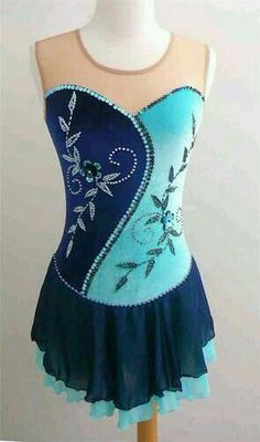 a dress on a mannequin with blue fabric