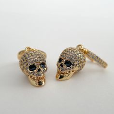 18K gold filled skull and huggie hoops, tarnish resistant, paved with cubic zirconia, shines like a dream.  Also available in the white gold filled, Please select desired finish in drop down menu.  1" drop down length, skull is 0.5" by 0.2" Gold Skull-shaped Earrings, Earrings Skull, Gift For Mom Birthday, Women Choker Necklace, Goth Earrings, Minimalist Earrings Gold, Gold Skull, Gothic Earrings, Earrings Halloween