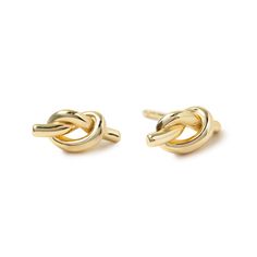 These classic Gold love knot studs are designed to represent love and unity. Great for everyday wear; worn on first or second hole piercings.Gold Vermeil Knot Specs 0.2x0.4in (5x11mm) #E315-G Piercings Gold, Knots Jewelry, Jewelry Gift Guide, Knot Stud Earrings, Knot Studs, Moms Bracelet, Choker Pendant, Gold Statement Ring, Studded Necklace