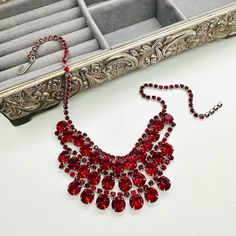 Gorgeous Ruby Vintage Red Rhinestone Choker Necklace. Faceted Layered Bib Glass Red Crystals. Unsigned. In Good Vintage Condition. A Miniature Mannequin Is Used For Photos, See Measurement Picture For Accurate Fit. Jewelry Box Prop Not Included. #Juliana #Luxury #Weiss #Swarovski #Austriancrystal #Schiaparelli #Runway #Designer #Vintagejewelry #Regency Schiaparelli Runway, Miniature Mannequin, Rhinestone Choker Necklace, Rhinestone Choker, Red Rhinestone, Red Crystals, Bib Necklace, Austrian Crystal, Womens Jewelry Necklace