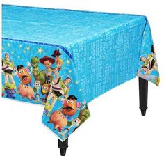 a blue table cloth with cartoon characters on it and an image of the character from toy story