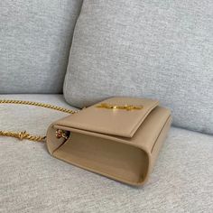 Size: 20cm*12.5cm*5cm It comes with Dust box, Care manual, Tag, and Paper bag. Designer Beige Rectangular Case Bag, Luxury Beige Rectangular Bag, Elegant Tan Box Bag With Dust Bag Included, Rectangular Tan Shoulder Bag With Dust Bag, Tan Rectangular Shoulder Bag With Dust Bag, Beige Rectangular Satchel With Chain Strap, Classic Tan Rectangular Box Bag, High-end Beige Rectangular Flap Bag, Luxury Beige Rectangular Shoulder Bag